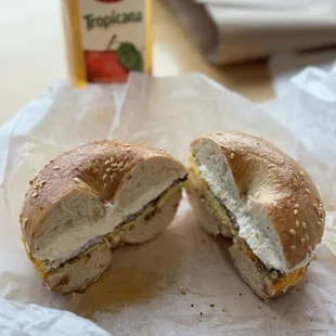 a half eaten sandwich with a bite taken out of it