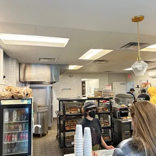 people in the kitchen of a restaurant