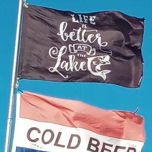 two flags flying in the wind