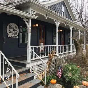 the front porch of the building