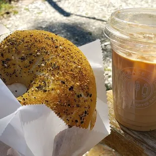 everything bagel with cream cheese and an iced latte
