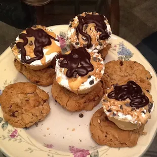 Shortbread cookie cupcake like crusts, w/ chocolate &amp; peanut butter whipped filling &amp; drizzled chocolate &amp; Carmel outside crunch