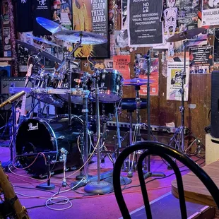 a drum set in a music studio