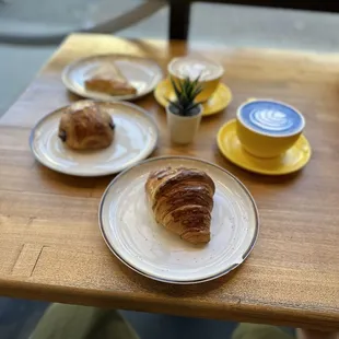 Chocolate almond croissant, Sweet Matcha Latte, Caramel Latte, Chocolate croissant, Ham and cheese croissant.