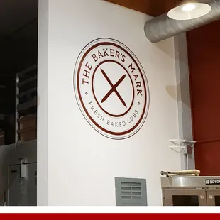 the logo on the wall