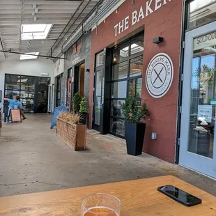 Picnic tables on Concrete deck  / loading dock of previous warehouses