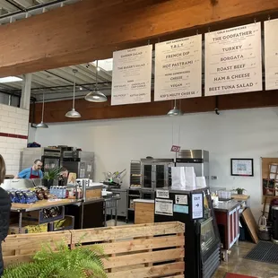 a woman standing in front of a counter