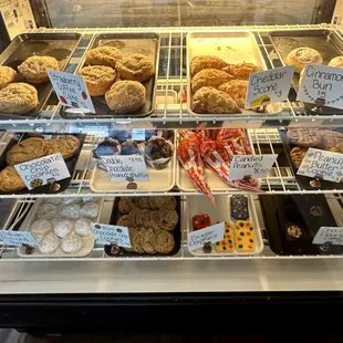 Display case of coffee cakes, scones, buns, cookies, etc.