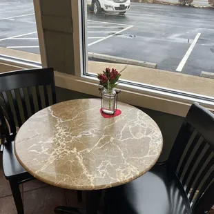 a table and two chairs