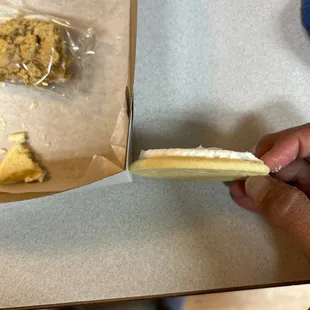 Thin sugar cookie compared to the cardboard box.