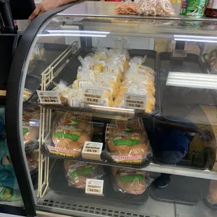 a display case filled with donuts