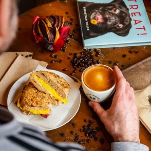 a man enjoying a cup of coffee