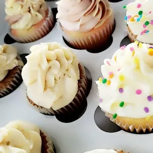 Funfetti, carrot cheesecake, and neopolitan shown here