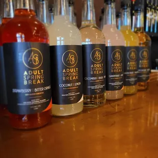 a row of bottles of alcohol