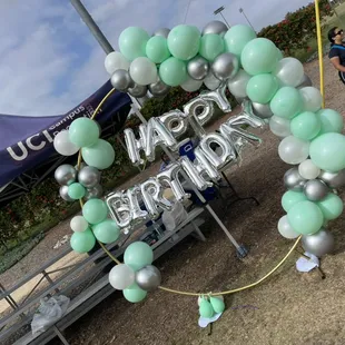 Round hoop stand with balloon garland