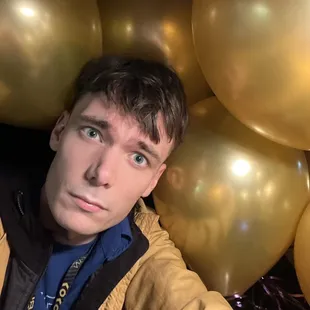 Driving w/ 25 gold balloons