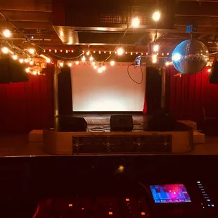 Behringer digital board. View from sound booth. Providing full sound system, mics, stands lighting, fog machine, chairs, tables etc..