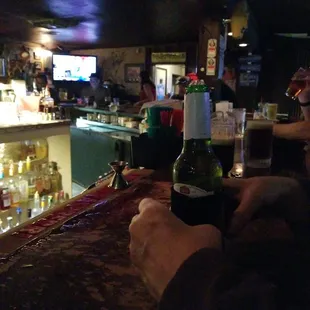 a man holding a beer