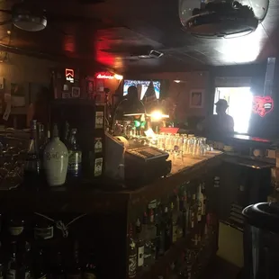 a bar with a television in the background
