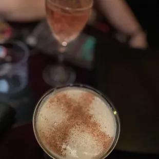 a glass of wine and a drink