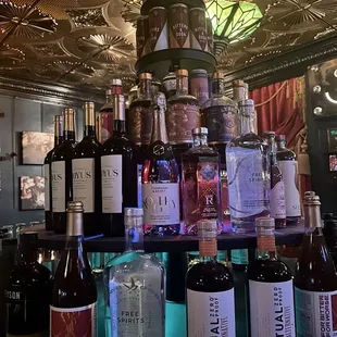 bottles of alcohol on a bar counter