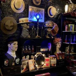a man's hat display in a music store
