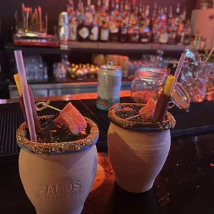 two cocktails on the bar