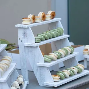 Display of custom macarons to match the theme of the wedding. Creme brulee and fruity pebbles.