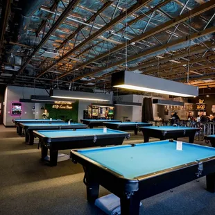 a pool table in a large room