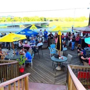 a crowd of people sitting at tables