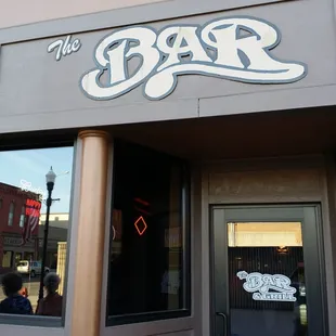 the entrance to the bar and grill