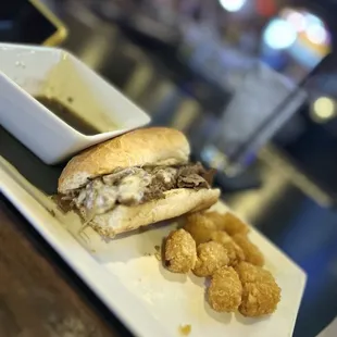 French Dip and partially eaten tots because I couldn&apos;t help myself.