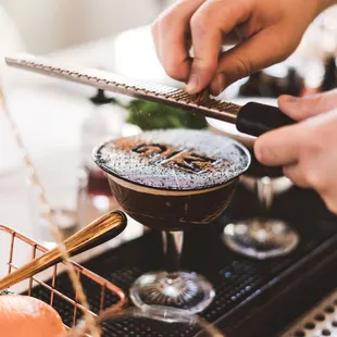 a bartender preparing a cocktail