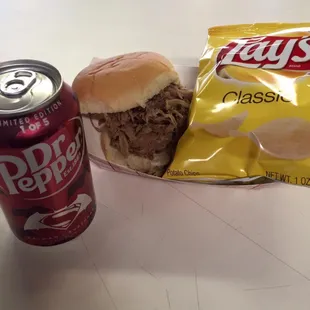 Brown Bag Special! Pulled Pork sandwich, chips and a drink.