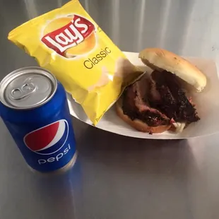 Brown Bag Special. Brisket sandwich, chips and a drink.
