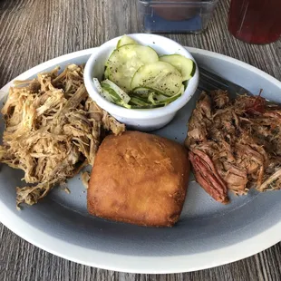 Meat Sampler. Pork Chicken with Cucumber and Onions and Roll.