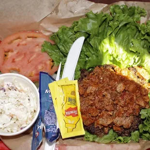 Bubba Burger on lettuce with coleslaw instead of a bun and fries