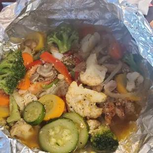 The Steamed Seafood Bomb! Shrimp, flounder and veggies! Delish and enough for 2 people! Also comes with a side!