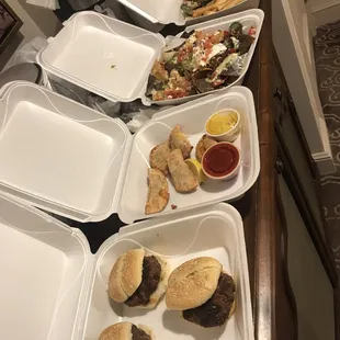 Sliders, shrimp empanadas, loaded nachos and tuna fish sandwich