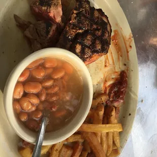 Bacon wrapped fillet with bar bean and crispy fries. I was hungry and got started before I took a picture.