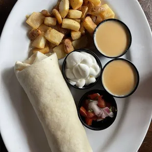 Egg &amp; cheesy burrito with question the side