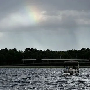 A rainbow over the Martins boat, in honor of Martin Pride Month