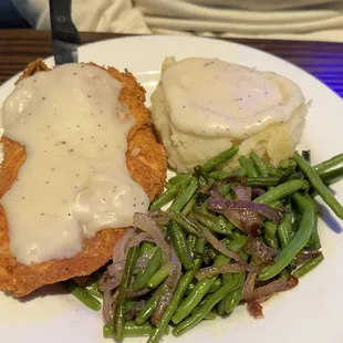 Chicken fried chicken with mashed potatoes green beans