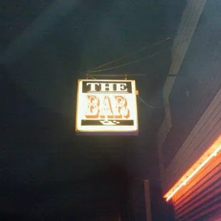 a neon sign for the bar