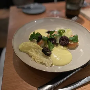 Scallops with morcilla sausage, savoy cabbage and saffron