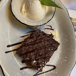 Warm flourless brownie with vanilla ice cream