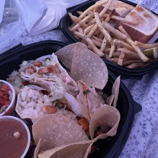  two trays of food