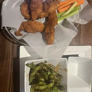 Plain chicken tenders and edamame
