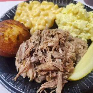 Pork plate with mac and cheese and potato salad