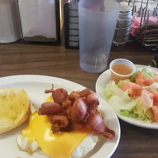 Breakfast all day. Breakfast sandwich and a side salad. Enjoy!